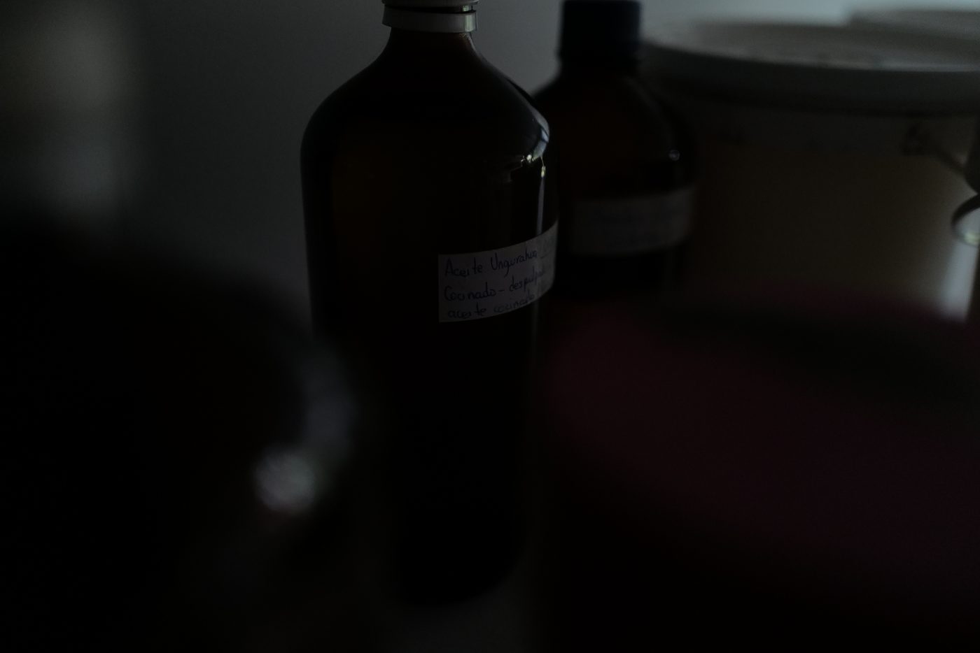 Labelled amber bottles of Ungurahua oil