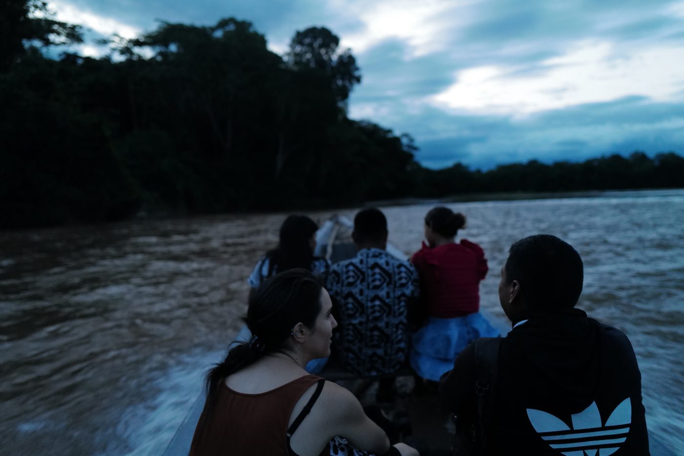 On the river at dusk, heading into the Amazon