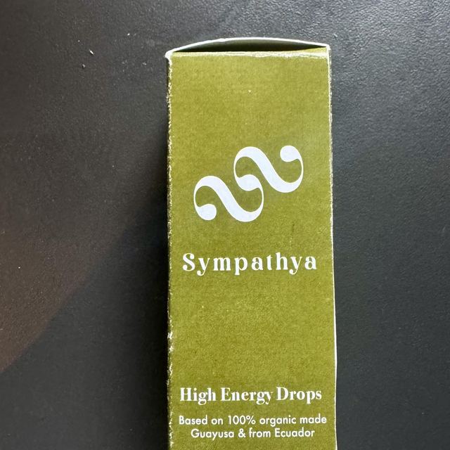 The Sympathya High Energy Drops box, olive green with the white mark